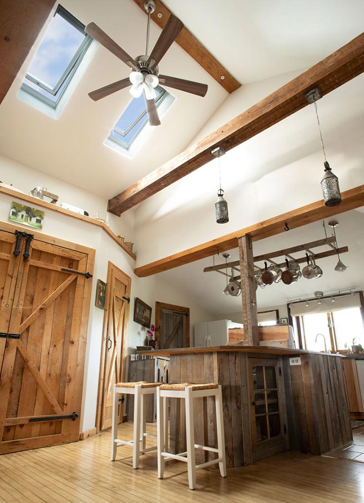 Kitchen view letting light in from new VELUX skylights